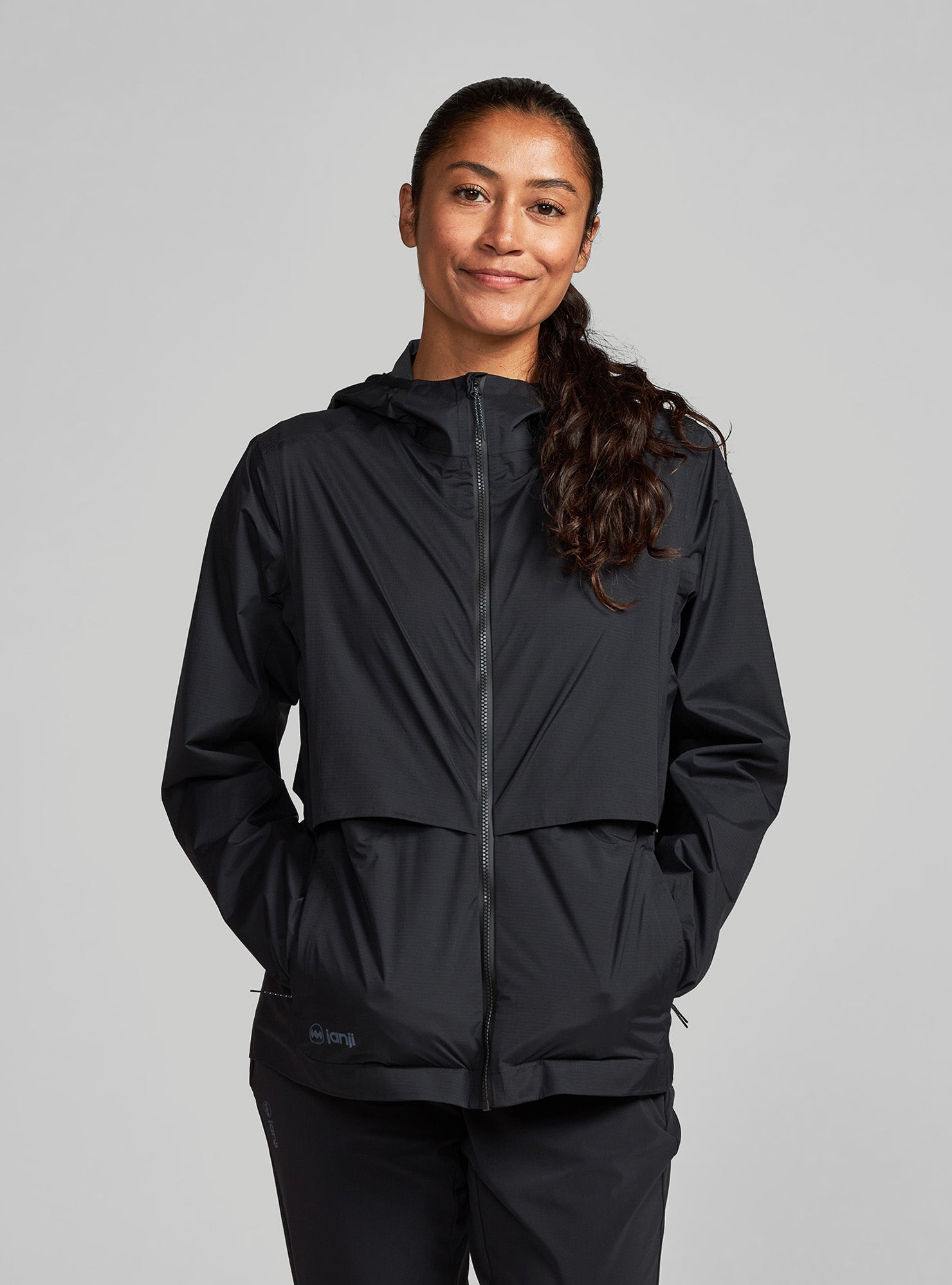 W's Rainrunner Pack Jacket – Janji