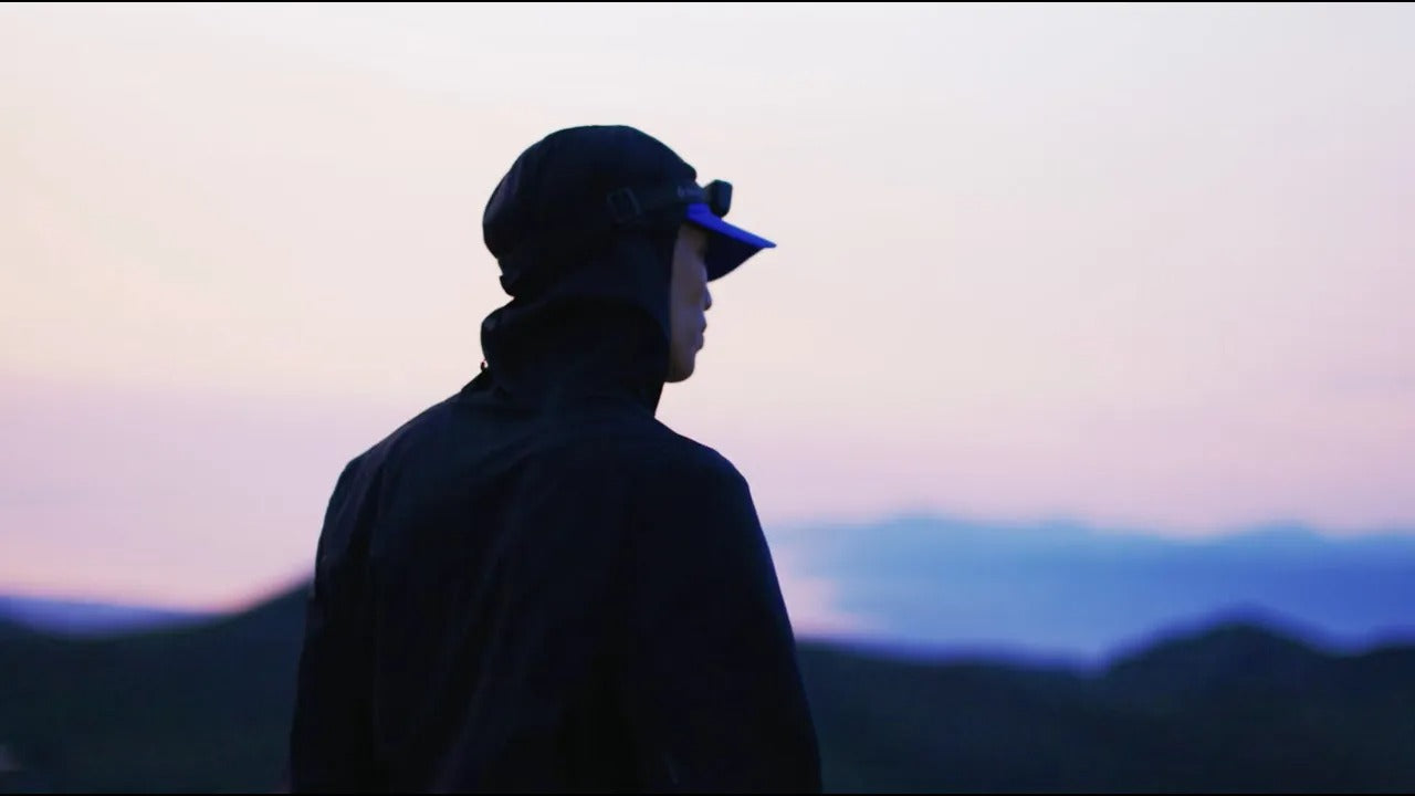 man overlooking mountain view